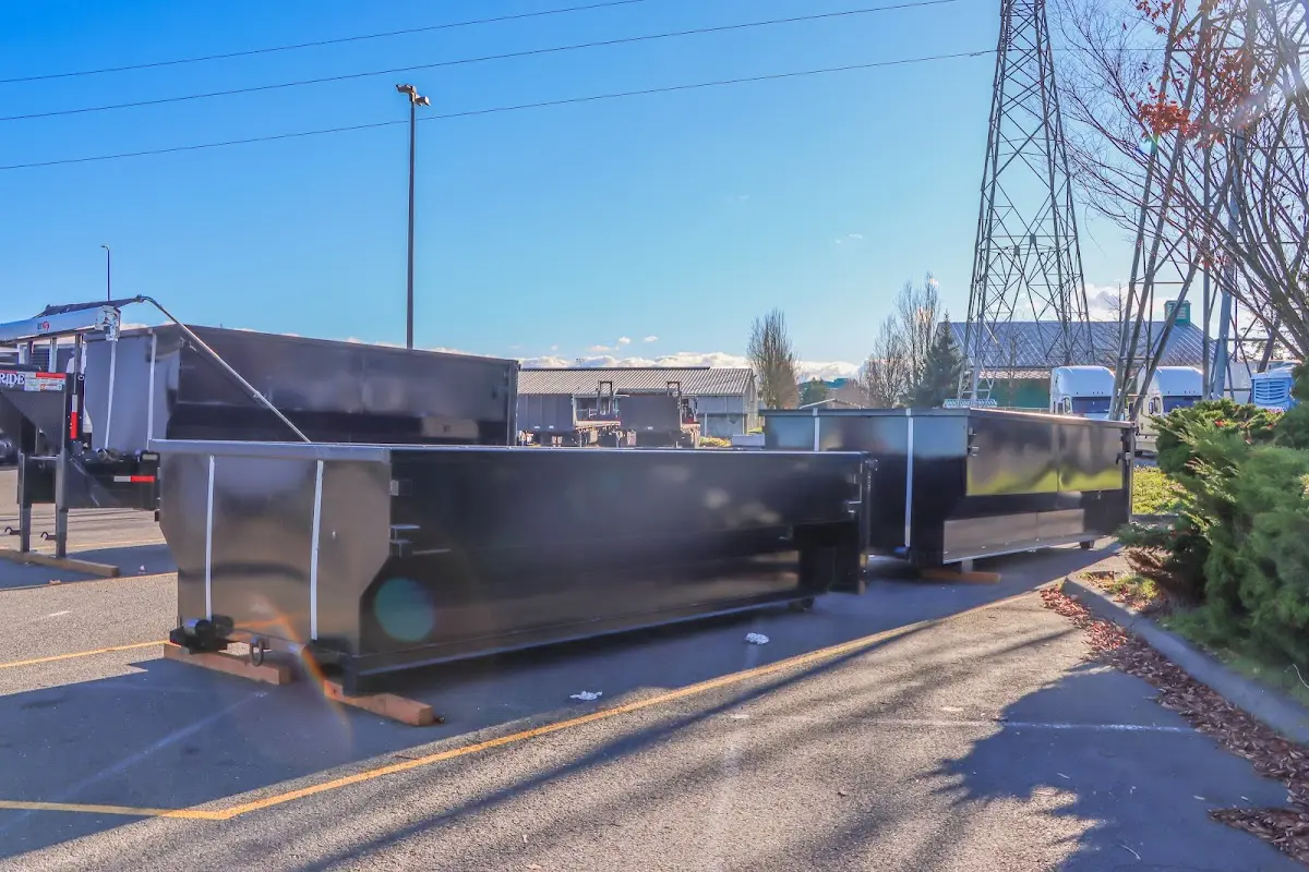 Roll-off dumpster ready for waste disposal at job site for 15 Yard Dumpster Rental in Randolph